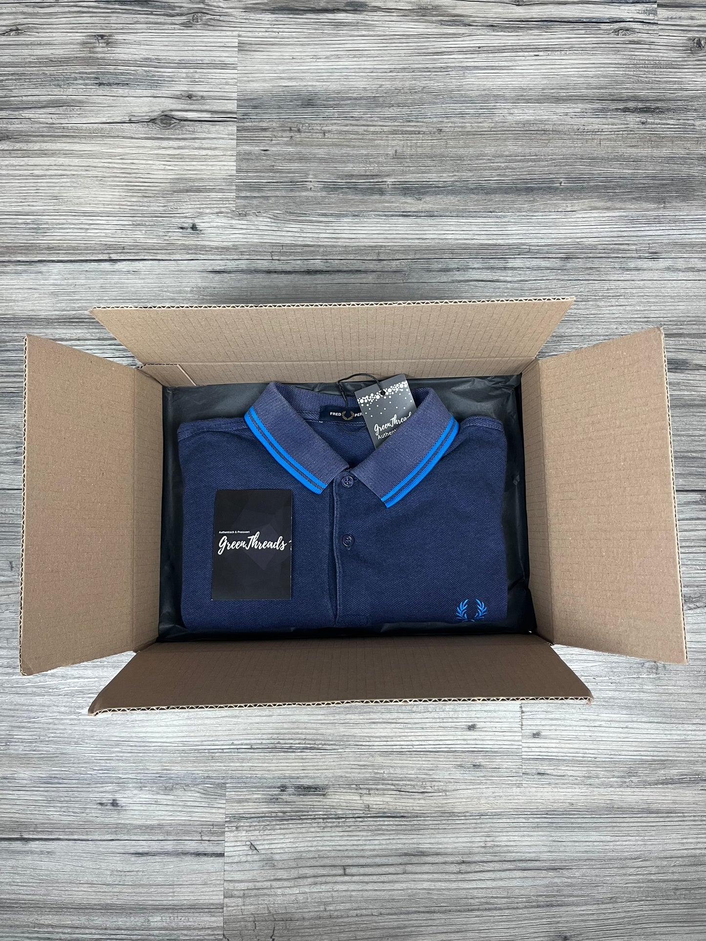 1x Fred Perry Poloshirt – Mystery Box