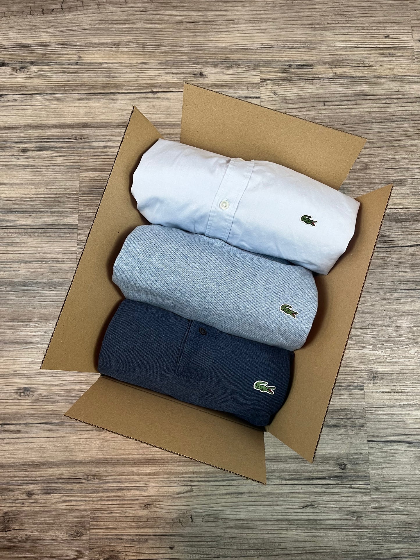 Mystery Box M: 3–4 Lacoste items – e.g., knitted sweaters, hoodies, polo shirts, and more