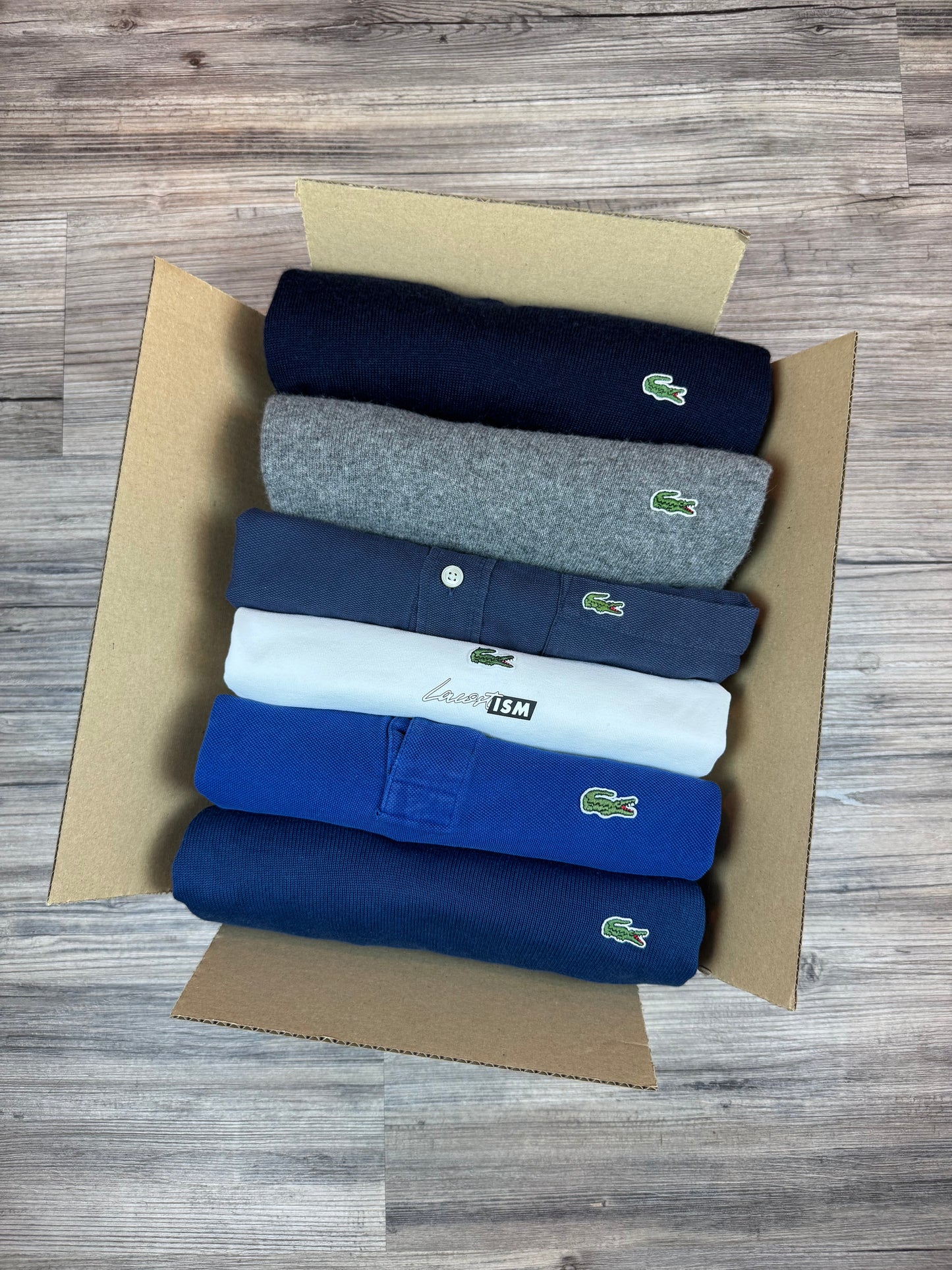 Mystery Box XXL: 5–7x Lacoste Artikel – Mix aus Strick, Hemd, Polo, Shirt & mehr